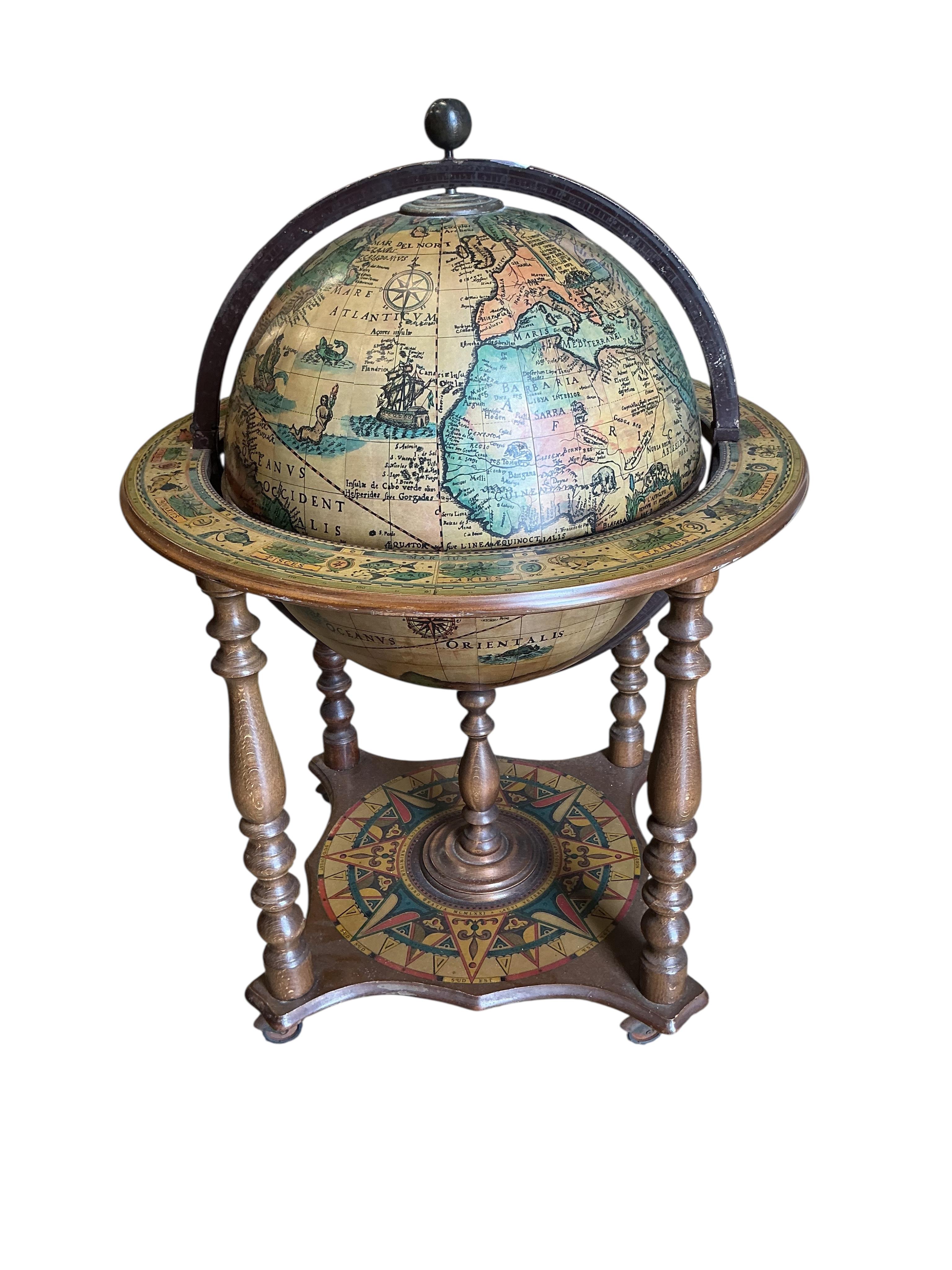 A globe; interior as a drinks cabinet, height 94cm